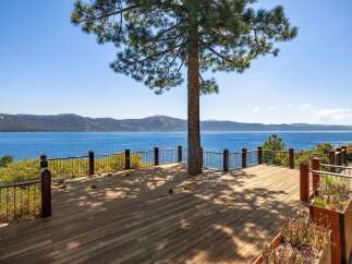 Experience breathtaking lake views from this stunning property.