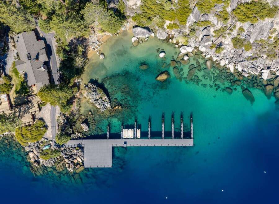 Discover waterfront luxury at this stunning property! Featuring a private dock, crystal-clear waters, and breathtaking views, this home offers an unparalleled lifestyle.