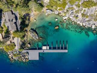Discover waterfront luxury at this stunning property! Featuring a private dock, crystal-clear waters, and breathtaking views, this home offers an unparalleled lifestyle.