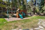 Discover the perfect family retreat with this stunning property! Featuring a charming playground with swings and a slide, it's an ideal space for kids to play and enjoy the outdoors.