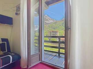 Enjoy breathtaking mountain views from this charming property.