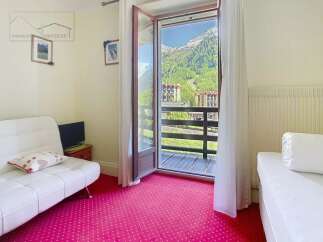 Experience breathtaking mountain views from this charming property.