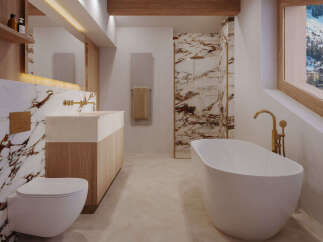 Experience luxury in this modern bathroom featuring a freestanding soaking tub and a sleek wall-mounted toilet.