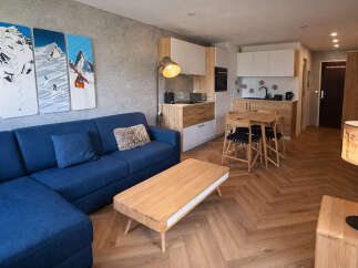 This stunning apartment offers a modern and inviting living space, perfect for a comfortable stay.