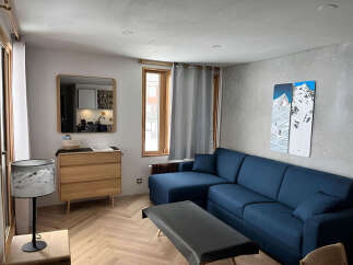 Discover this stylish living space, perfect for relaxation and entertaining.
