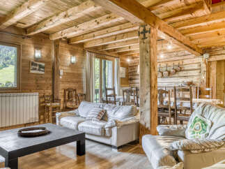 Step into rustic elegance with this stunning property, showcasing a warm and inviting interior.