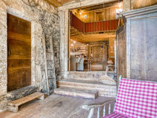 Step into rustic charm with this inviting property.