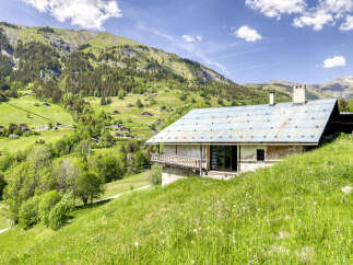 Nestled in the heart of the mountains, this charming property offers breathtaking views and a tranquil escape.