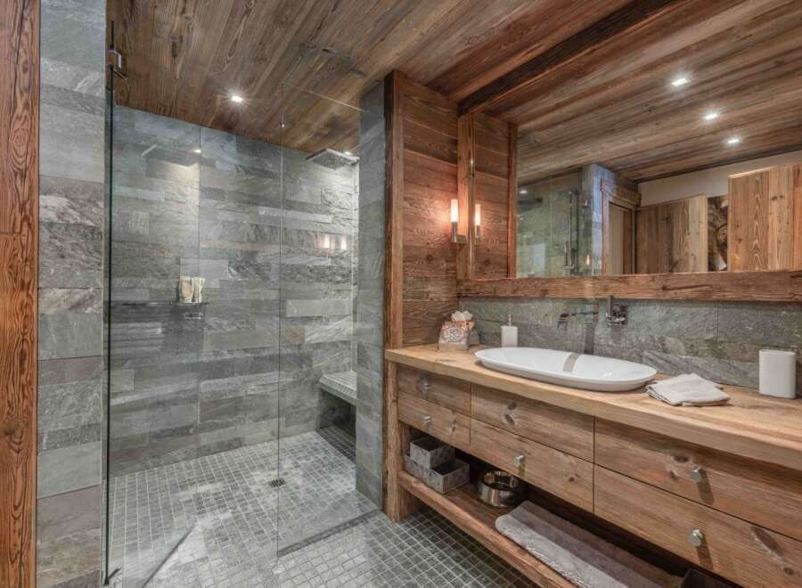 Experience rustic luxury in this stunning bathroom.