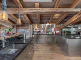 Experience rustic elegance in this stunning kitchen.