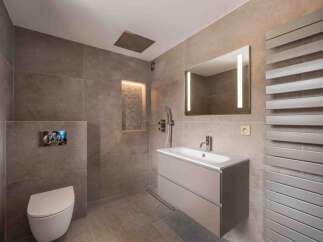 Step into a modern bathroom oasis, featuring sleek design elements and luxurious finishes.
