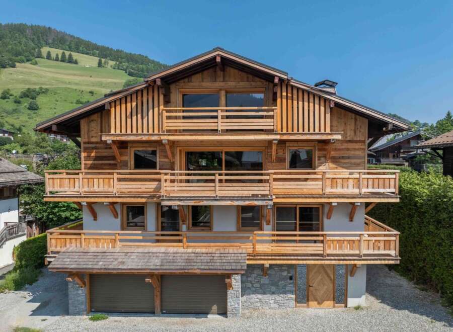 This stunning wooden chalet offers a perfect blend of rustic charm and modern elegance.