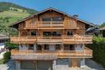 This stunning wooden chalet offers a perfect blend of rustic charm and modern elegance.
