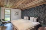 Experience luxury and comfort in this stunning bedroom.