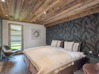 Experience luxury and comfort in this stunning bedroom.