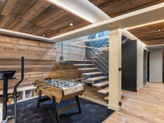 This stunning property boasts a unique blend of rustic charm and modern design.