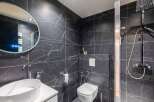 Step into luxury with this stunning modern bathroom.