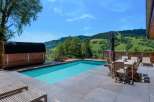 Enjoy luxurious outdoor living with this stunning property featuring a private pool and a relaxing sauna.