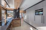 Experience luxury living in this stunning kitchen, featuring a modern design with high-end appliances.