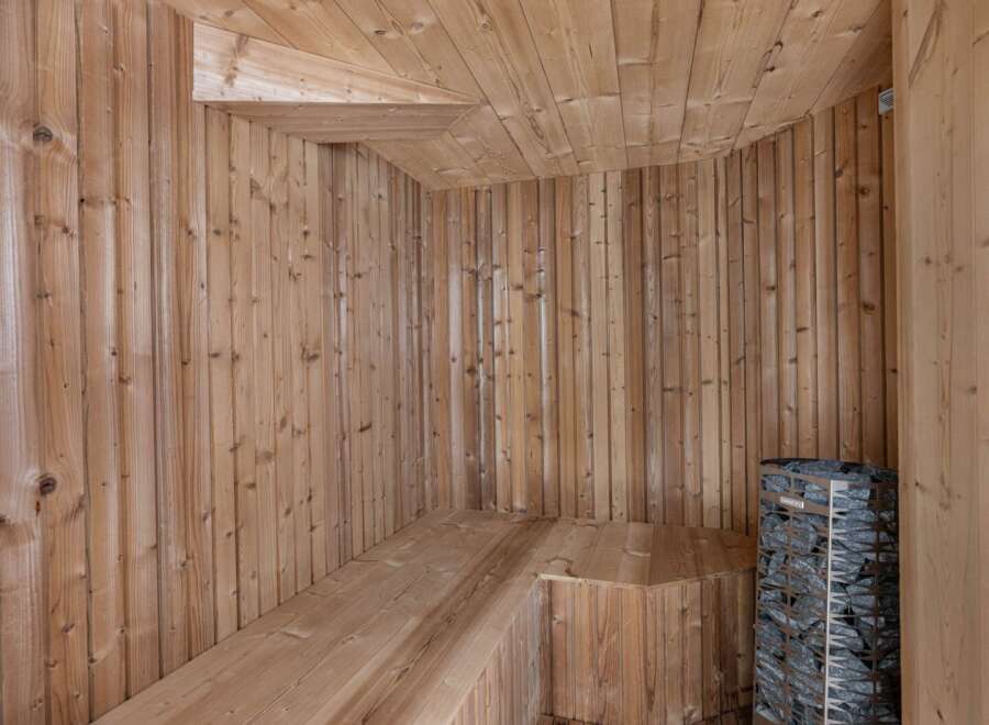 Step into relaxation with this stunning sauna.