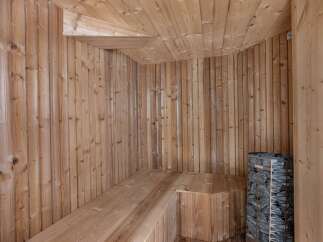 Step into relaxation with this stunning sauna.