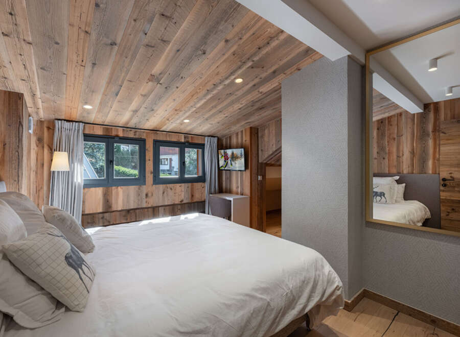 Experience rustic elegance in this stunning bedroom.