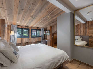 Experience rustic elegance in this stunning bedroom.