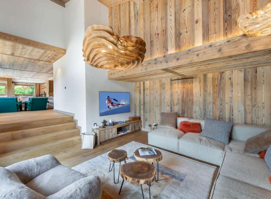 Experience luxury living in this stunning property featuring a cozy living room with a modern design.