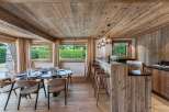 Experience rustic elegance in this stunning property, featuring a beautifully designed dining area and a stylish bar.