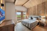 Experience the epitome of alpine luxury in this stunning bedroom.