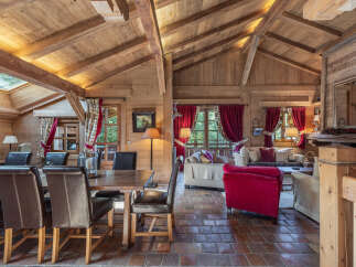 Step into luxury with this stunning chalet-style home, boasting exquisite wooden interiors and a warm, inviting atmosphere.