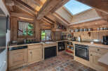 Step into this charming kitchen, a perfect blend of rustic elegance and modern convenience.