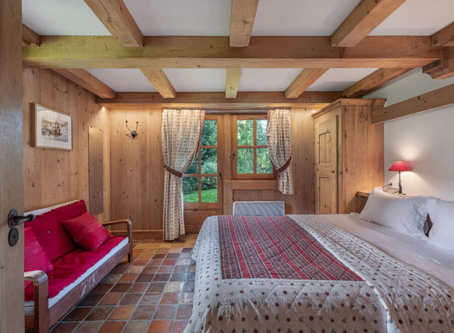 Step into a cozy bedroom retreat with rustic charm.