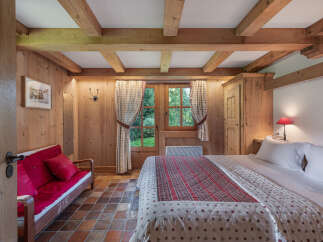 Step into a cozy bedroom retreat with rustic charm.