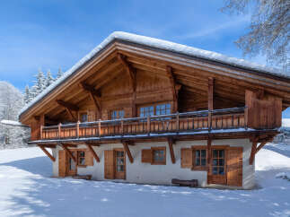 This stunning wooden chalet offers a perfect blend of rustic charm and modern comfort.