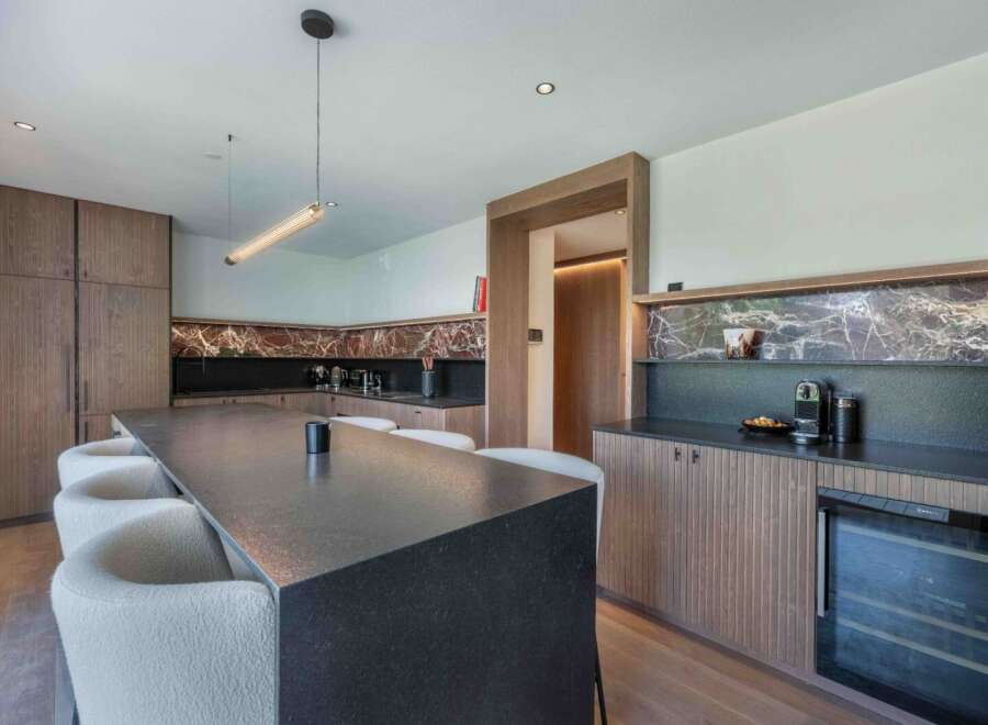 Experience modern luxury in this stunning kitchen.