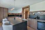 Experience modern luxury in this stunning kitchen.