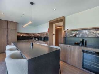 Experience modern luxury in this stunning kitchen.