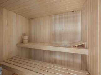 Step into relaxation with this stunning sauna.