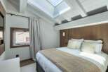 Experience luxury and comfort in this stunning bedroom.