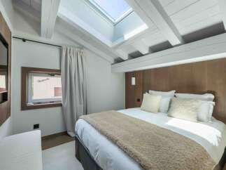 Experience luxury and comfort in this stunning bedroom.