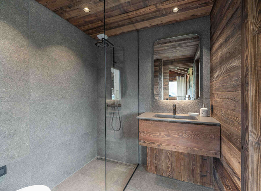 Experience rustic elegance in this stunning bathroom.