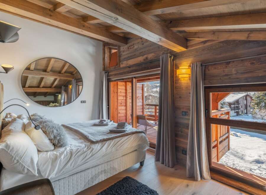 Experience the ultimate in alpine luxury with this stunning bedroom.
