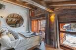 Experience the ultimate in alpine luxury with this stunning bedroom.