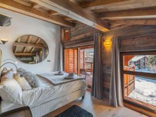 Experience the ultimate in alpine luxury with this stunning bedroom.