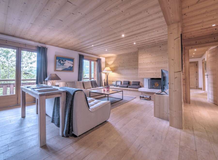 This stunning living room showcases a cozy fireplace, perfect for chilly evenings.