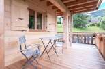 Enjoy the tranquility of this charming wooden cabin, perfect for a relaxing getaway.