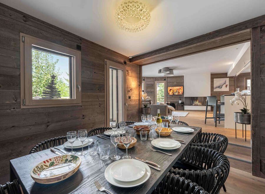 Experience luxury living in this stunning property, featuring a beautifully designed dining area perfect for entertaining.