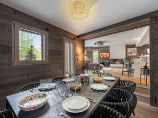 Experience luxury living in this stunning property, featuring a beautifully designed dining area perfect for entertaining.