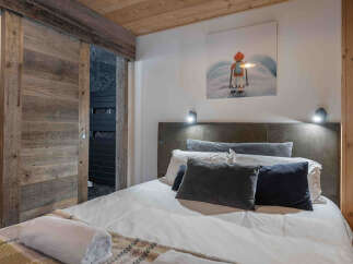 Experience the epitome of comfort and style in this beautifully designed bedroom.